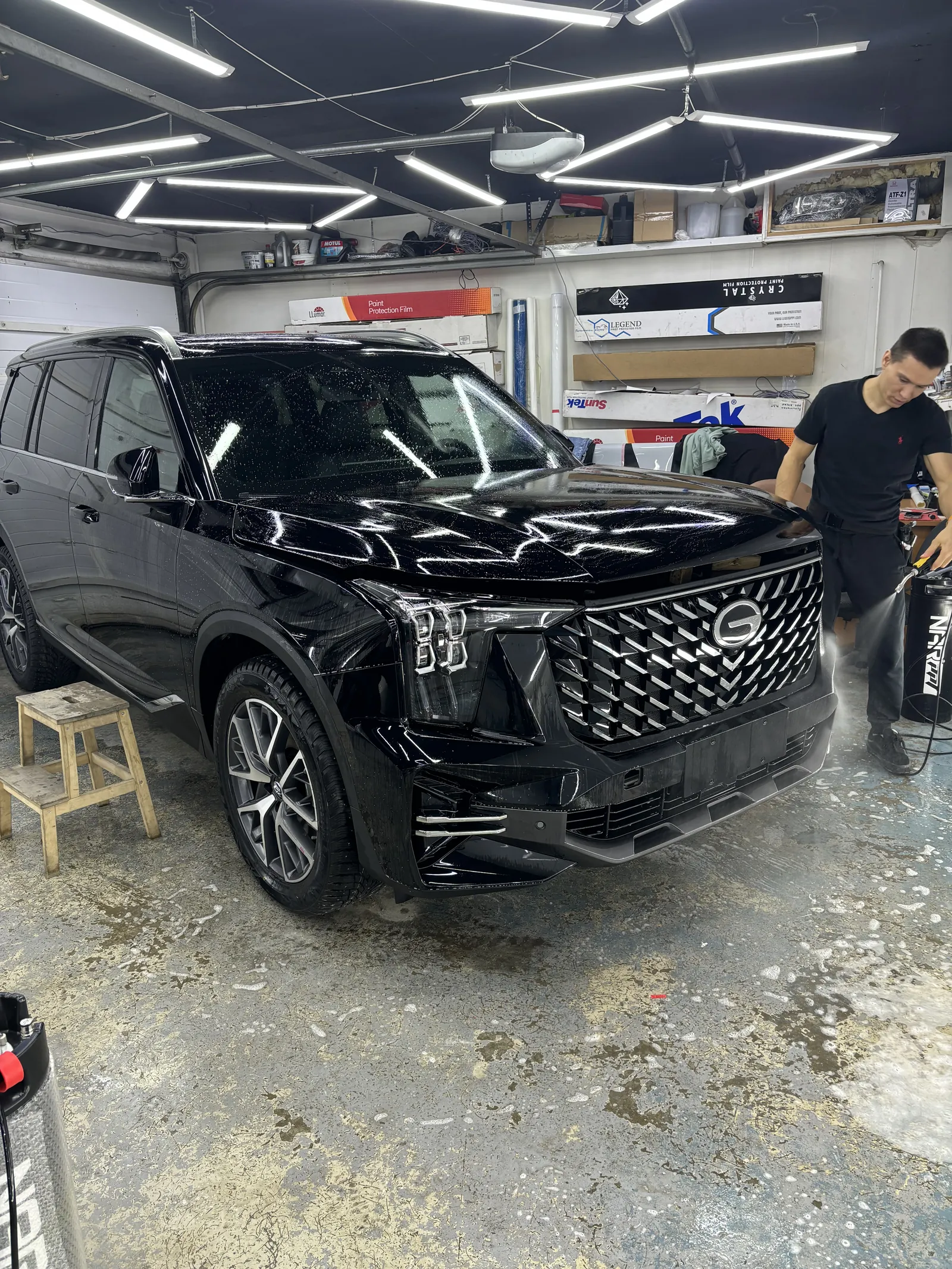 Контроль поверхности автомобиля GAC после нанесения плёнки